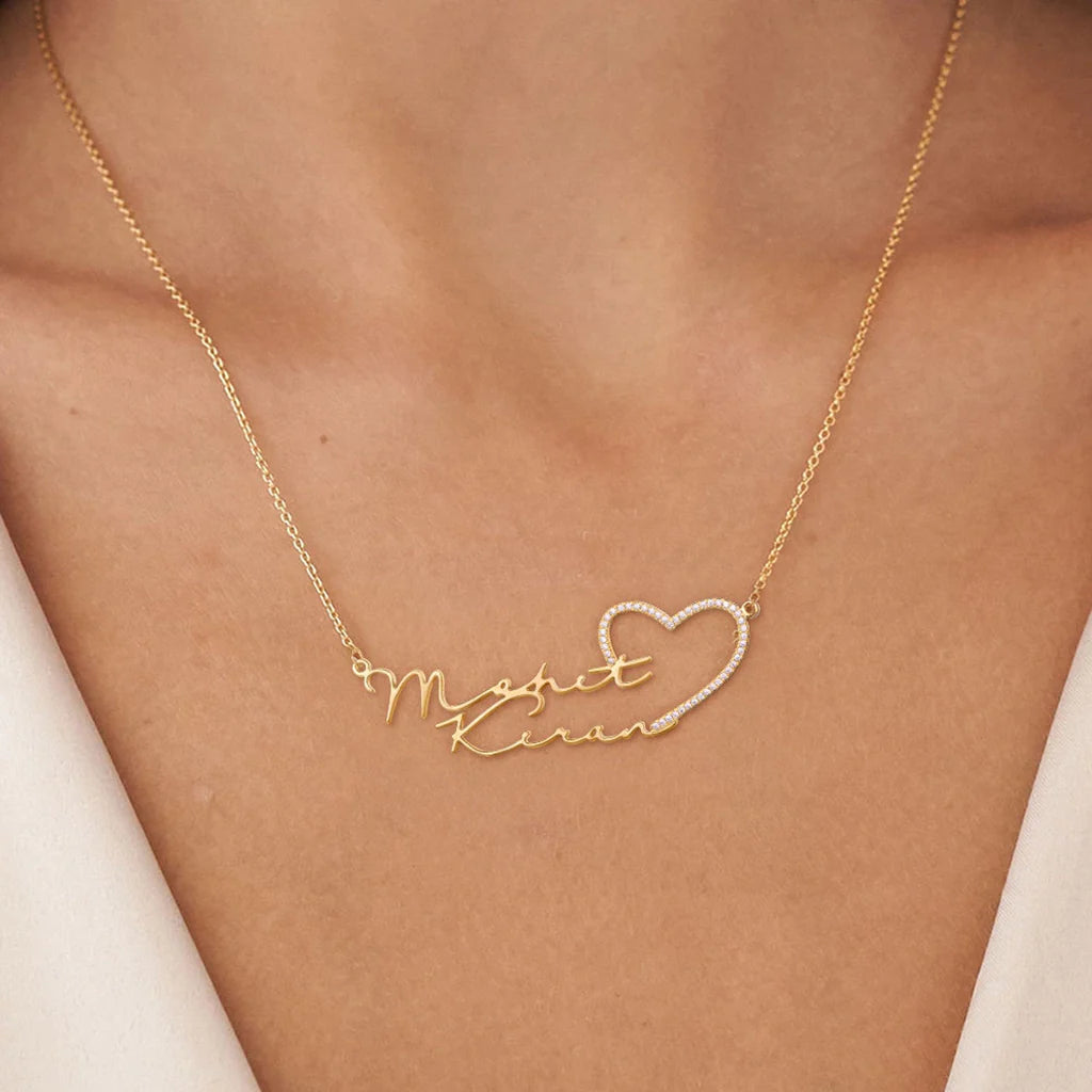 Diamond double name necklace with heart pendant from MUHVA STORE, featuring personalized name charms and sparkling diamond accents.