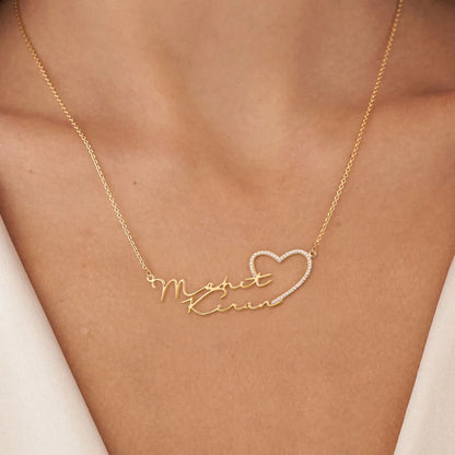 Diamond double name necklace with heart pendant from MUHVA STORE, featuring personalized name charms and sparkling diamond accents.