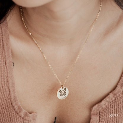 Pair of custom pet portrait necklaces by Muhva Store featuring detailed engraved pet images on elegant jewelry.
