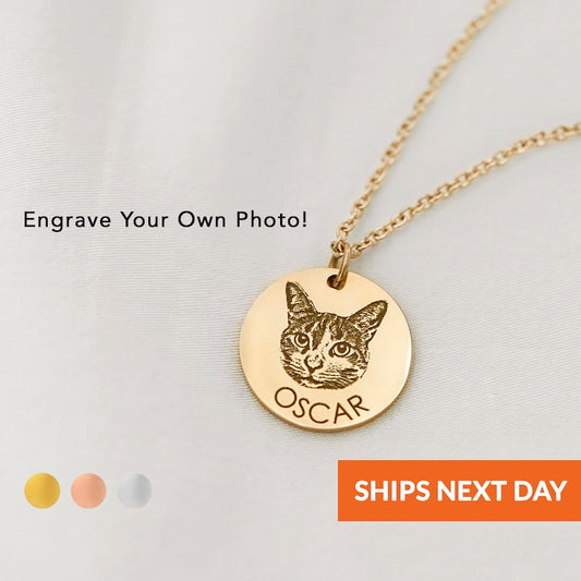 Two custom pet portrait necklaces by Muhva Store, featuring detailed engraved pet images on silver-tone pendants.