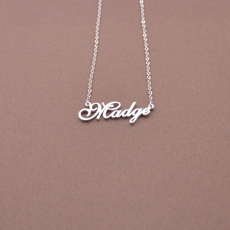 Personalized name necklace from Muhva Store with custom engraved name in elegant silver finish.