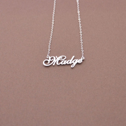 Personalized name necklace from Muhva Store with custom engraved name in elegant silver finish.