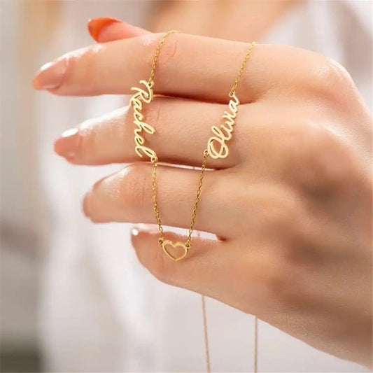 Custom two-name necklace with heart pendant from Muhva Store, featuring personalized names in elegant script.