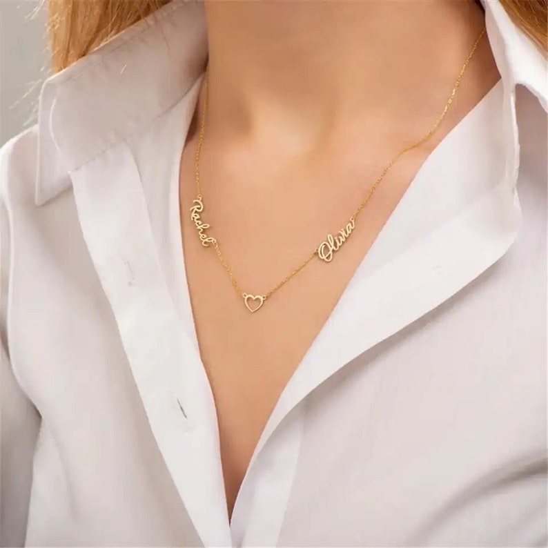 Personalized two-name necklace with heart pendant from Muhva Store, featuring custom names on a delicate chain.