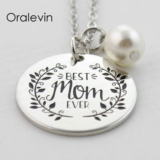 Pair of Muhva Store "Best Mom Ever" necklaces featuring heart and pendant designs on delicate chains.