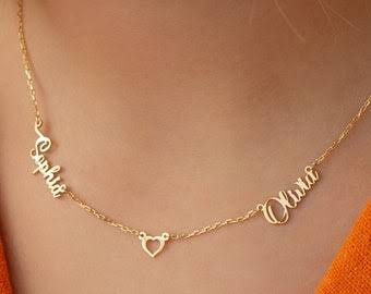 Customize two name necklace with heart pendant, featuring personalized names on a sleek chain, by Muhva Store.