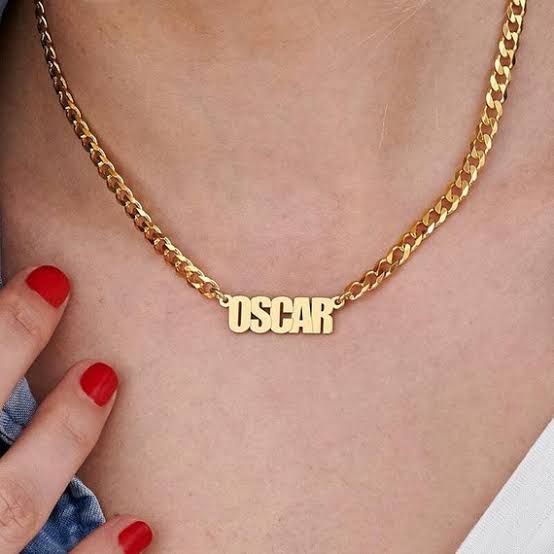 Personalized name necklace by Muhva Store featuring a sleek chain and custom engraved name charm.